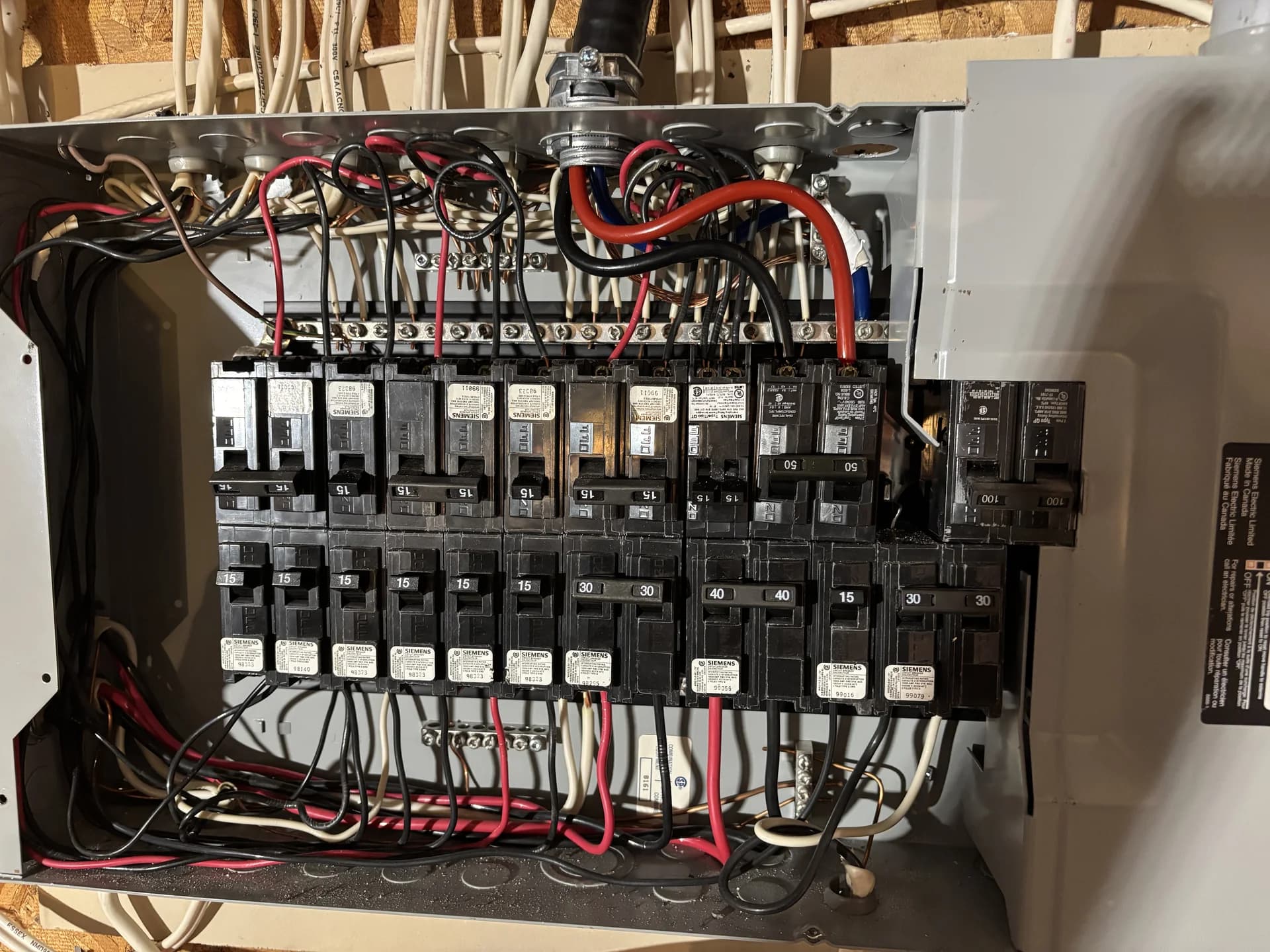 Clean residential electrical panel installed by Top Choice Electrical, every breaker labelled by circuit